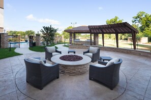 Enjoy the outdoor fire pit.