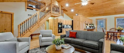Living room - open floor plan with lots of beautiful pine boards!