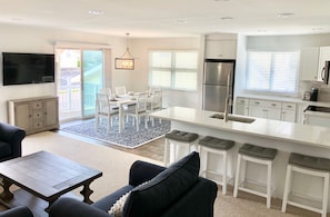 Open concept kitchen / dining / living