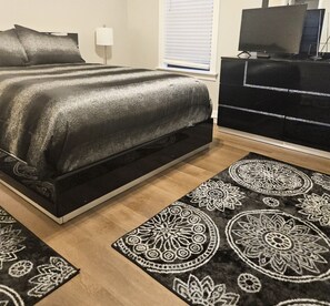 Modern Comfort Awaits – Drift off in this bold and stylish bedroom designed for restful nights and sleek vibes.