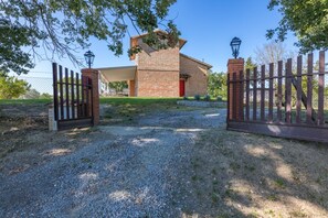 Gated entrance to the property with ample free secured parking.