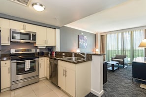 Kitchen overlooks living area #1611