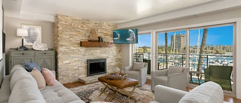 Living room: overlooking the harbor. Smart TV

The fireplace is to not be utilized.