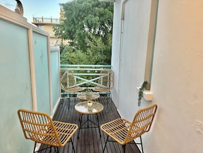 Small balcony accessible from air-conditioned living/dining room