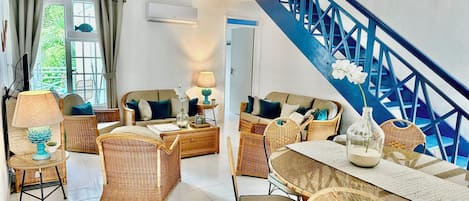 Superb airconditioned living room -doors to balcony + door to downstairs bedroom