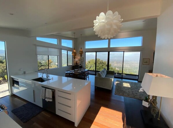 Two skylights bathe the open concept, state of the art property in light.