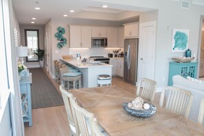 Curb your appetite by cooking a meal in your kitchen.
