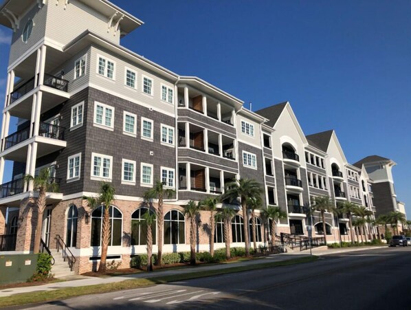 View of a resort property showing the detailed architecture and welcoming entryways.
