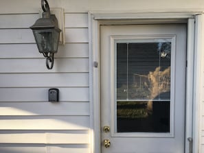 Your entrance off back patio, with self check in lockbox.