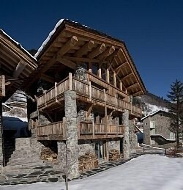 Exterior view of chalet in winter