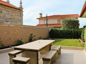 Plant, Sky, Property, Cloud, Building, Table, Furniture, Outdoor Table, Window, Tree