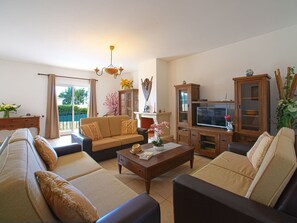 Brown, Property, Couch, Plant, Furniture, Table, Houseplant, Living Room, Orange, Interior Design