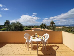 Cloud, Sky, Furniture, Property, Table, Chair, Outdoor Table, Outdoor Furniture, Building, Natural Landscape