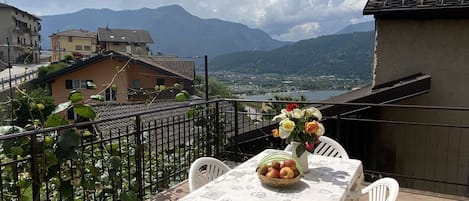 Cloud, Table, Sky, Building, Property, Furniture, Flowerpot, Plant, Food, Mountain