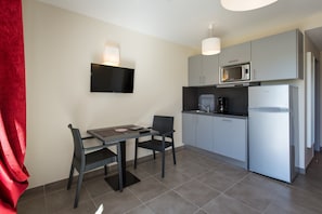 Curb your appetite by making a snack in your kitchenette.