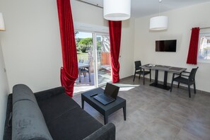 Sink into the cozy sofa after a day exploring the area.