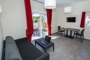 Sink into the cozy sofa after a day exploring the area.