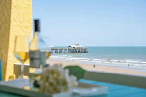 Enjoy a glass of wine on your private balcony while taking in the breathtaking views of Folly beach.
