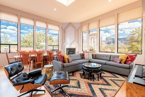 Bright and Open Main Level Great Room with Plenty of Windows to Bring in the Natural Light