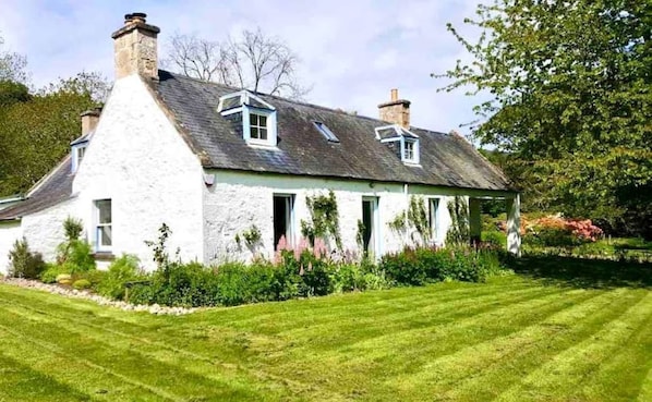 Charming old stone cottage in its garden