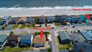 Just 5 homes down the street to the public beach access.