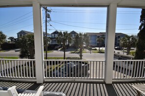 Feel the ocean breeze from the covered porch!