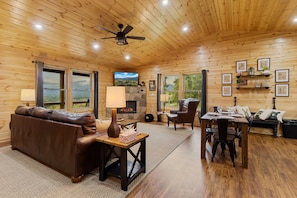 Open family room with vaulted ceiling