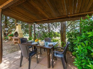 Plant, Furniture, Table, Chair, Shade, Wood, Interior Design, Tree, Outdoor Furniture, Cottage
