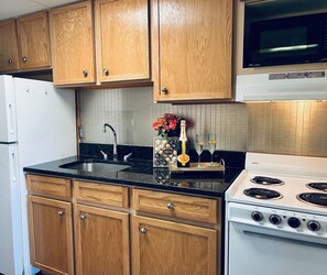 Cook up in our kitchen equipped with necessary appliances!