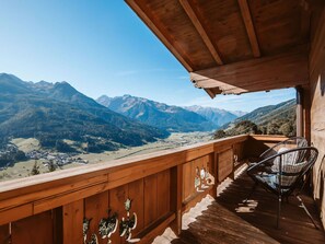 Sky, Mountain, Wood, Porch, Tree, House, Building, Wood Stain, Leisure, Landscape