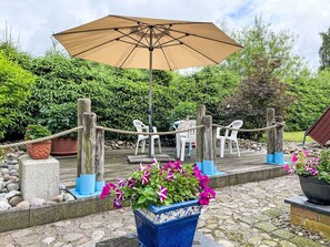 Plant, Flower, Building, Property, Flowerpot, Houseplant, Umbrella, Botany, Shade, Outdoor Furniture