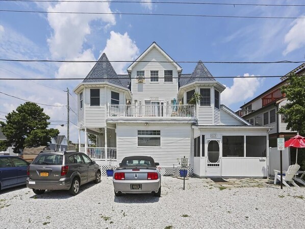 Side of the House w/Parking Area and Entry to the House.