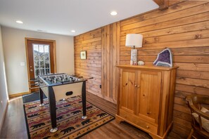 Game Room on Lower Level with Foosball Table, Exterior Door onto Lower Rear Hot Tub Deck