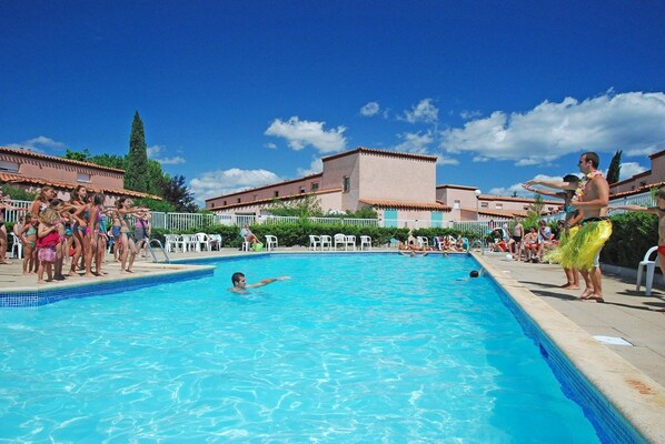 Spend time with family and friends in the outdoor pool during the summer.