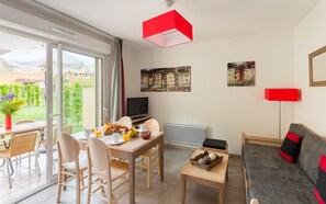 Reconnect with loved ones over a meal at the dining table.