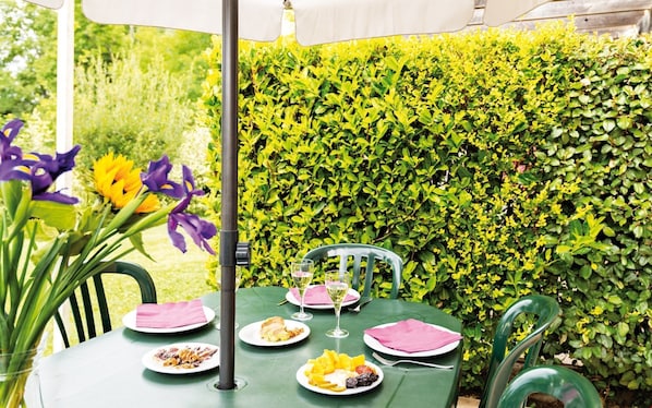 Enjoy reminiscing about your day while sipping a glass of wine outside on the patio.
