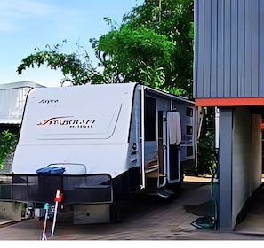Ample easy access parking for caravans, boats or trailers - wide driveway.