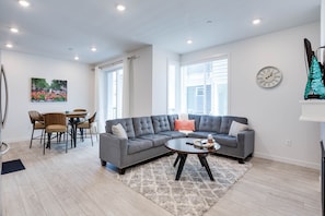 Living Room with Large Windows for Maximum Natural Light!