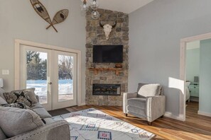 Living Room with Smart TV and Electric Fireplace
