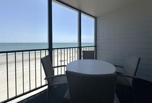 Feel the ocean breeze from your private screened balcony.