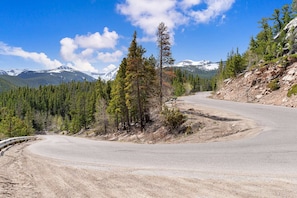 Fall River Road is windy but oh-so-scenic! Look at those snowcapped mountains in May.