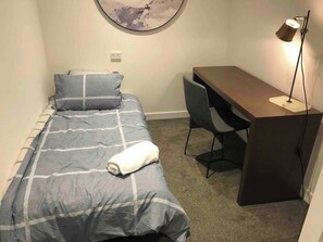 Extra single bed with desk and chair.We prepare one comfortable single bed in this study area.