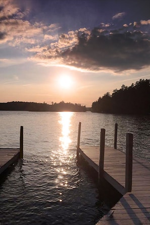 Large U-shaped dock holds three boats.