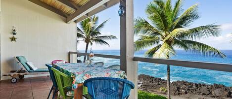 Large absolute oceanfront condo with BIG lanai offering 2 chaise lounge chairs and dinning room table. Year round sunset from your lanai.