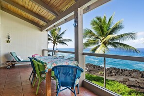Large absolute oceanfront condo with BIG lanai offering 2 chaise lounge chairs and dinning room table. Year round sunset from your lanai.