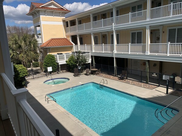 Courtyard with pool, hot tub, grills for cooking