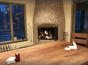 Fireplace in dining room, just off the kitchen and three seasons room.