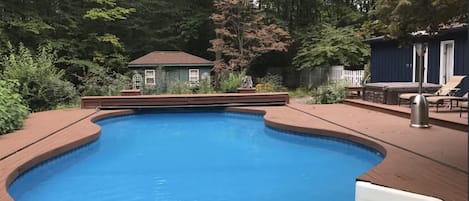 Memorial Day - Labor Day enjoy the private pool in the wooded 5 acre backyard.