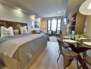 This may be a studio, but for couples or friends there's plenty of space to rest and relax.