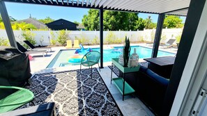 Outdoor Patio has Large Pergola which can be used open or closed